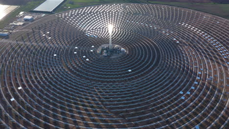 Large-aerial-view-over-a-solar-power-tower-Spain-renewable-energy-Thermosolar